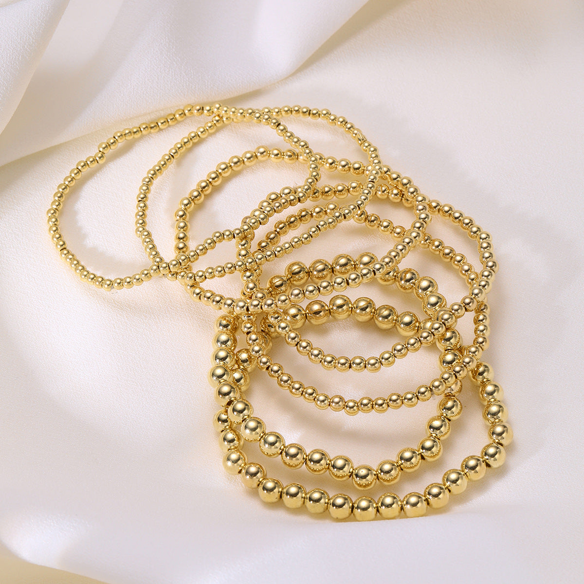 Wholesale Fashionable and simple elastic beaded bracelets 7 pieces